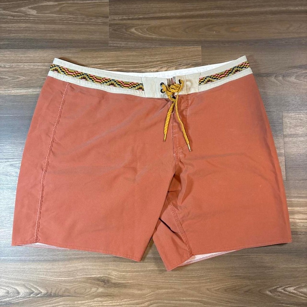 Billabong board shorts in solid rust orange